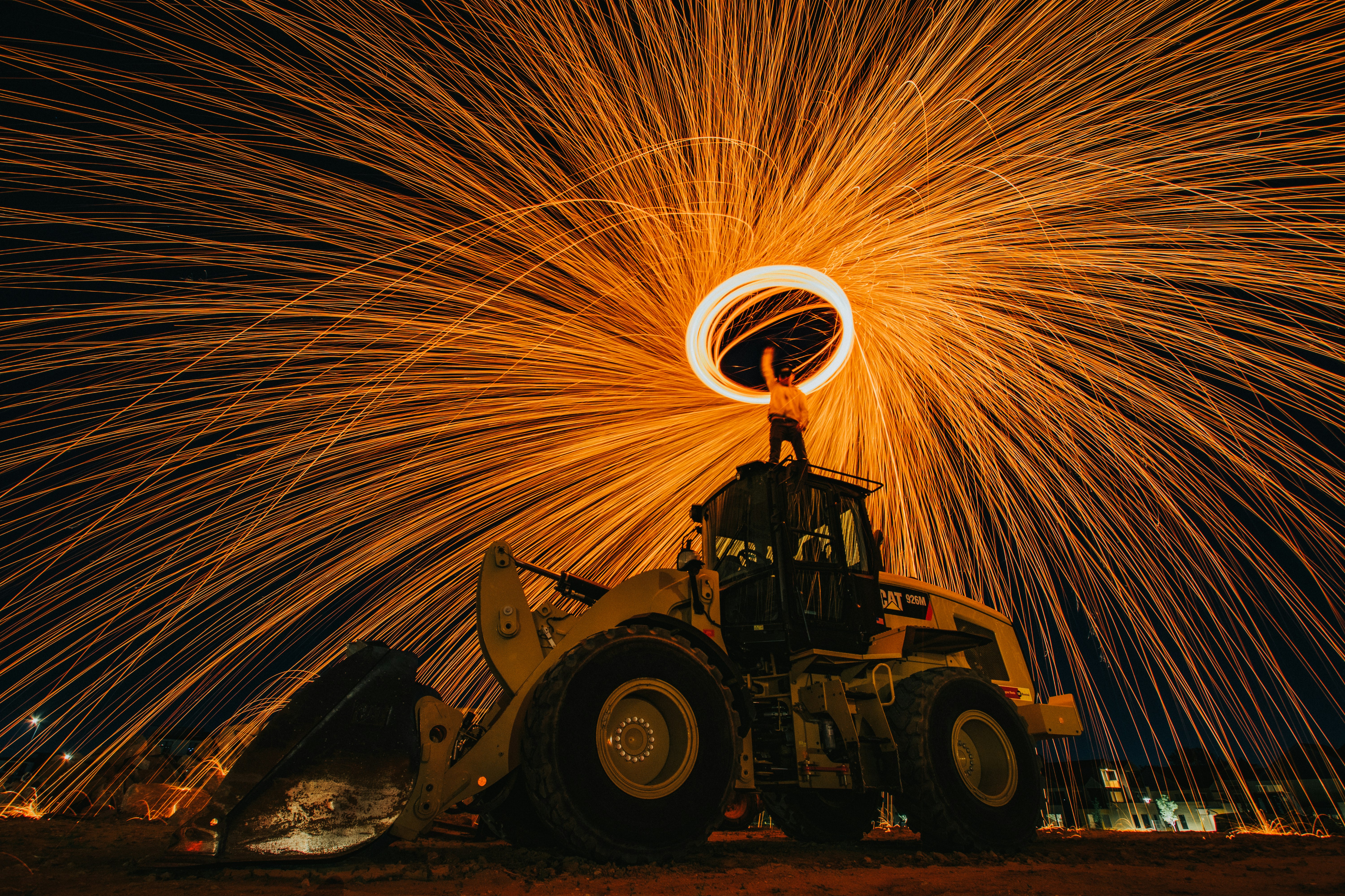 man riding tractor on fire